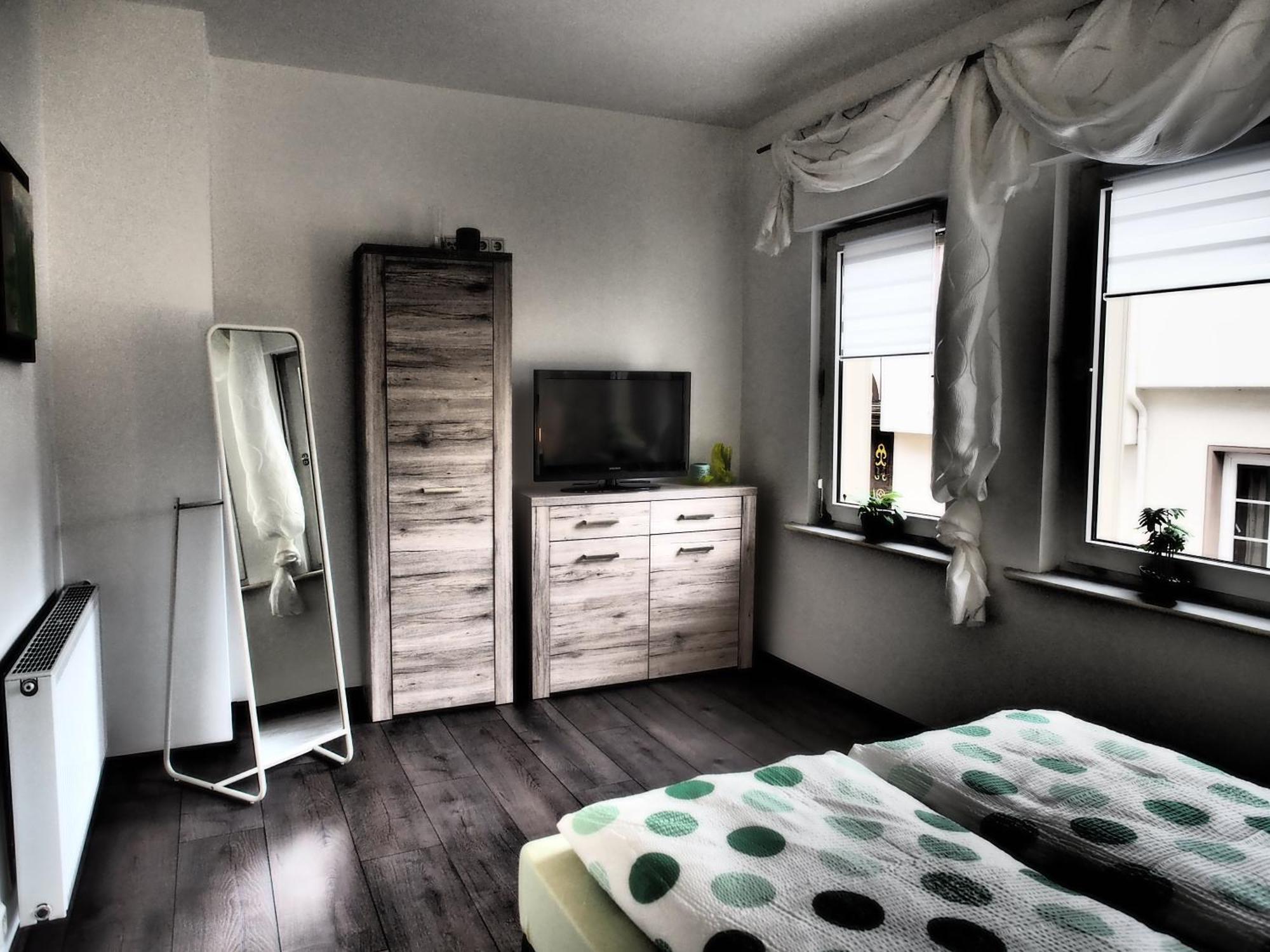 Weincafé Korkenzieher Briedel Chambre photo