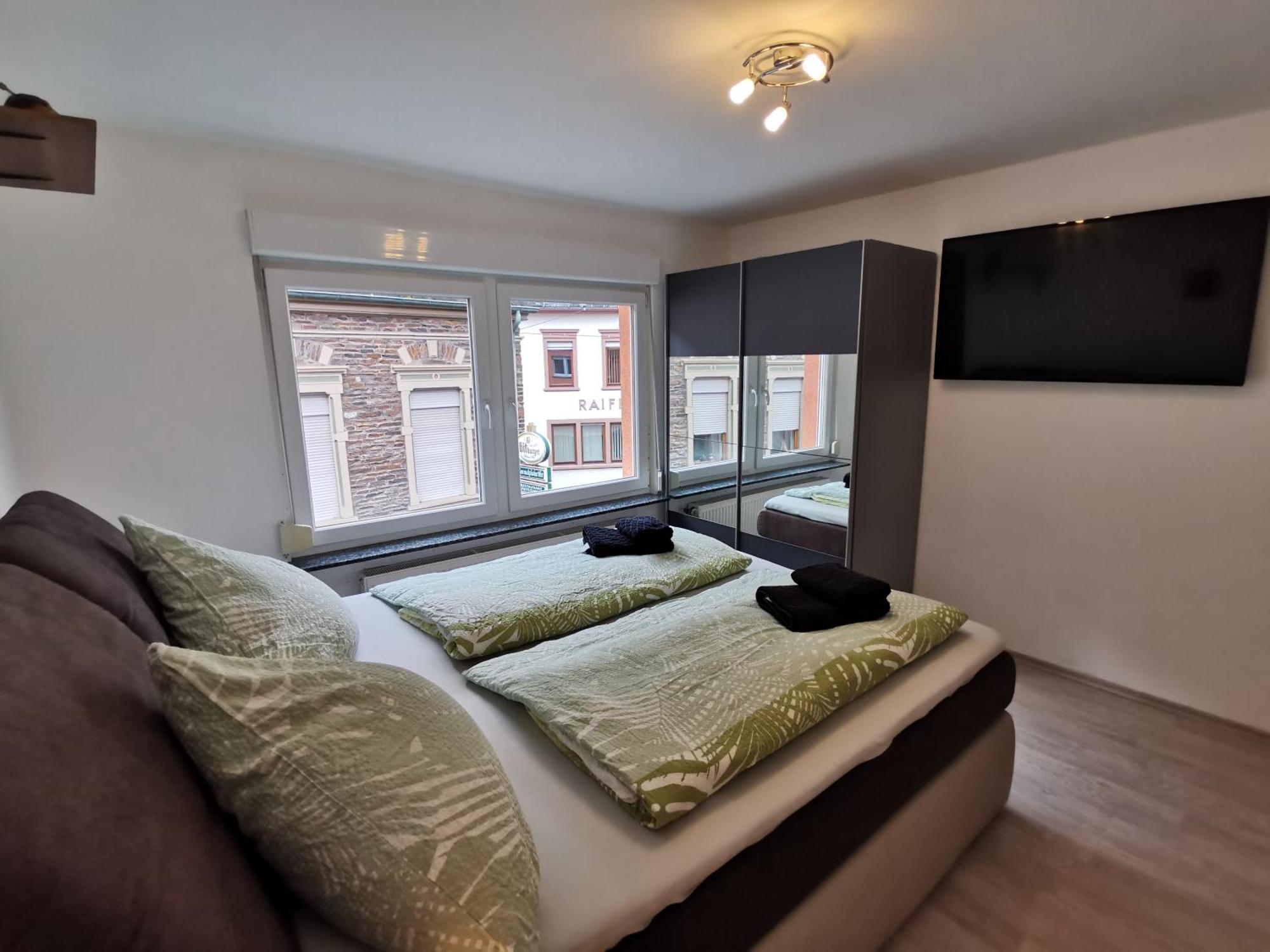 Weincafé Korkenzieher Briedel Chambre photo